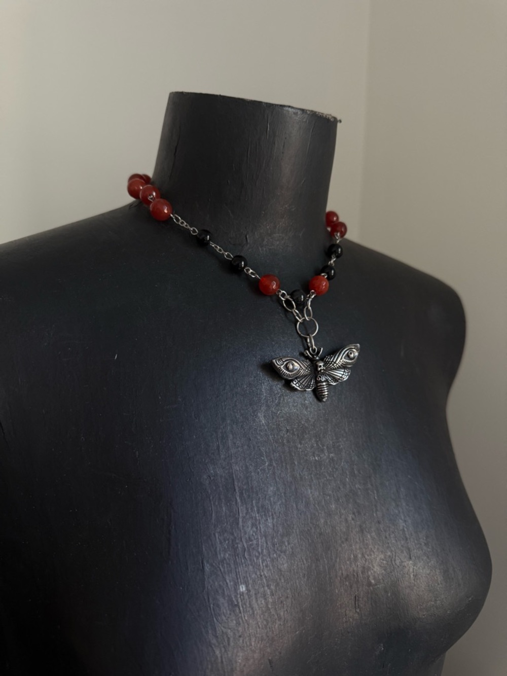 Carnelian and obsidian hand beaded choker necklace with moth pendant stainless
